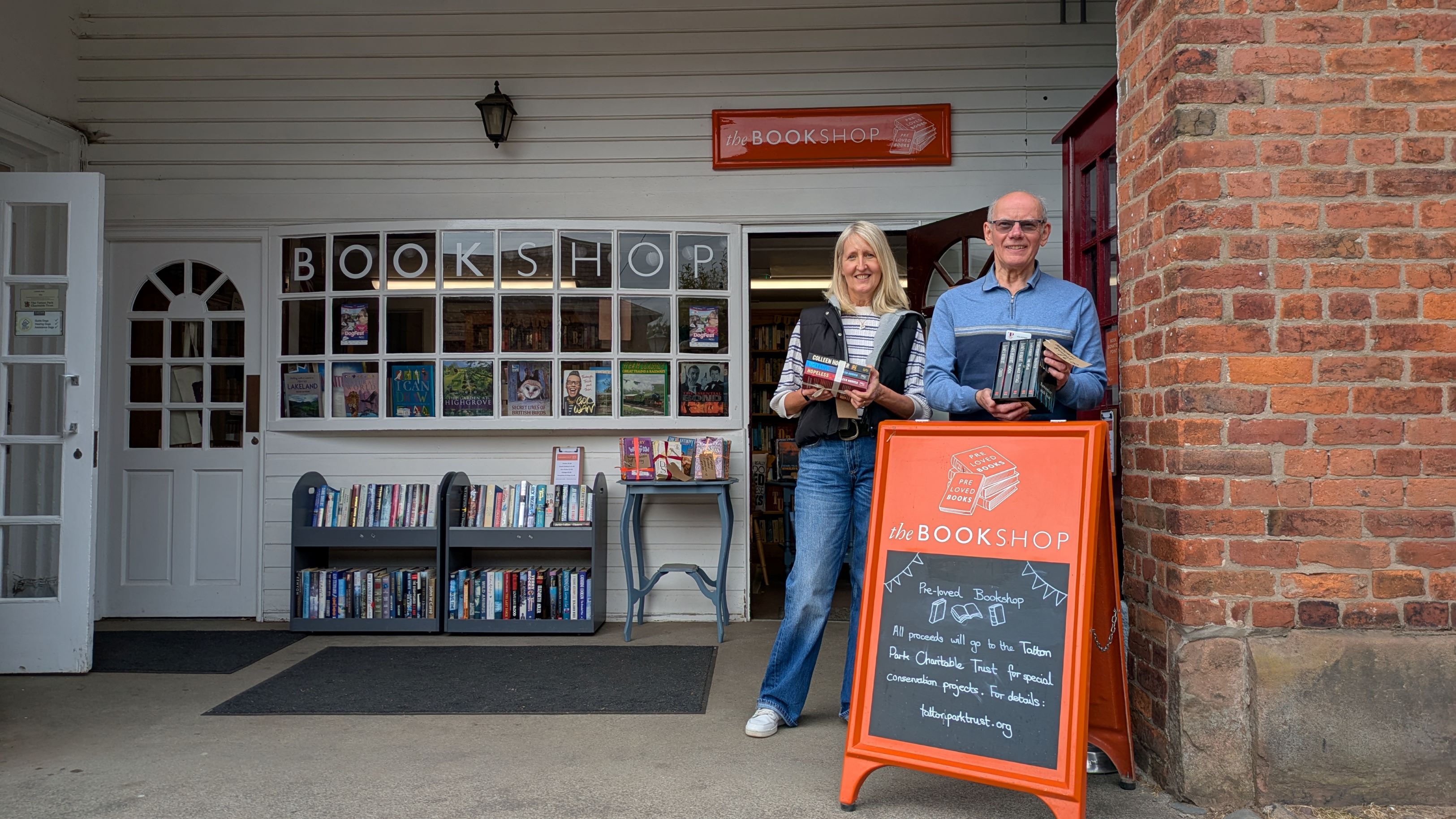 Mandy Edwardson, Volunteer And John Twigg, Trustee Outside The Preloved Bookshop